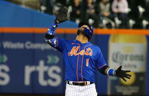 Sep 28, 2021; New York City, New York, USA; New York Mets third baseman Jonathan Villar (1) reacts after hitting a double against the Miami Marlins during the fifth inning of game two of a doubleheader at Citi Field. Mandatory Credit: Andy Marlin-USA TODAY Sports