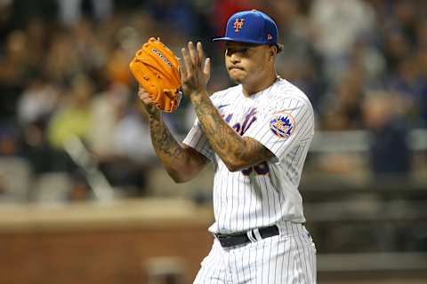 Sep 29, 2021; New York City, New York, USA; New York Mets starting pitcher Taijuan Walker (99) claps as he leaves the game against the Miami Marlins during the eighth inning at Citi Field. Mandatory Credit: Brad Penner-USA TODAY Sports