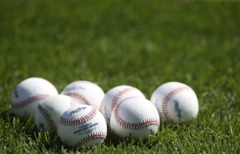 Sep 15, 2015; Pittsburgh, PA, USA; MLB baseballs sit on the field before the Pittsburgh Pirates host the Chicago Cubs at PNC Park. Mandatory Credit: Charles LeClaire-USA TODAY Sports