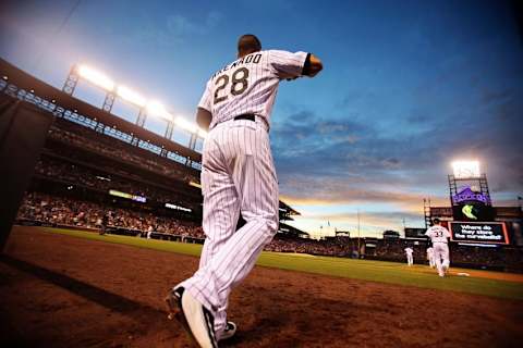 Sep 5, 2015; Denver, CO, USA; Colorado Rockies third baseman Nolan Arenado (28) during the fourth inning against the San Francisco Giants at Coors Field. Mandatory Credit: Chris Humphreys-USA TODAY Sports