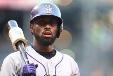 Aug 28, 2015; Pittsburgh, PA, USA; Colorado Rockies shortstop Jose Reyes (7) looks on in the on-deck circle against the Pittsburgh Pirates during the first inning at PNC Park. Mandatory Credit: Charles LeClaire-USA TODAY Sports