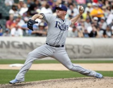 Aug 5, 2015; Chicago, IL, USA; Tampa Bay Rays relief pitcher Jake McGee (57) throws a pitch against the Chicago White Sox during the eight inning of the baseball game at U.S Cellular Field. Mandatory Credit: Kamil Krzaczynski-USA TODAY Sports