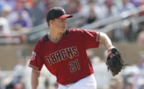 Mar 14, 2016; Salt River Pima-Maricopa, AZ, USA; Arizona Diamondbacks starting pitcher Zack Greinke (21) throws the ball in the first inning during a spring training game against the Seattle Mariners at Salt River Fields at Talking Stick. Mandatory Credit: Rick Scuteri-USA TODAY Sports