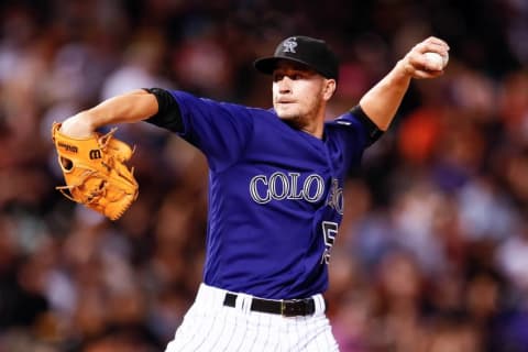 Apr 13, 2016; Denver, CO, USA; Colorado Rockies starting pitcher Chris Rusin (52) delivers a pitch in the fifth inning against the San Francisco Giants at Coors Field. The Rockies defeated the Giants 10-6. Mandatory Credit: Isaiah J. Downing-USA TODAY Sports