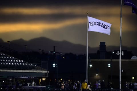 Jun 24, 2015; Denver, CO, USA; General view of a Colorado Rockies banner during a sunset over Coors Field in the fourth inning against the Arizona Diamondbacks at Coors Field. Mandatory Credit: Ron Chenoy-USA TODAY Sports