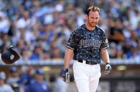 May 22, 2016; San Diego, CA, USA; San Diego Padres third baseman Adam Rosales (9) reacts after making the last out of the ninth inning against the Los Angeles Dodgers at Petco Park. Mandatory Credit: Jake Roth-USA TODAY Sports