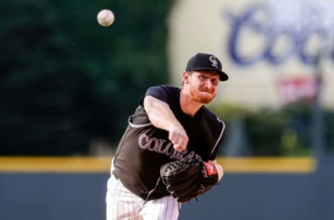 Jun 23, 2016; Denver, CO, USA; Colorado Rockies starting pitcher Eddie Butler (31) delivers a pitch in the first inning against the Arizona Diamondbacks at Coors Field. Mandatory Credit: Isaiah J. Downing-USA TODAY Sports