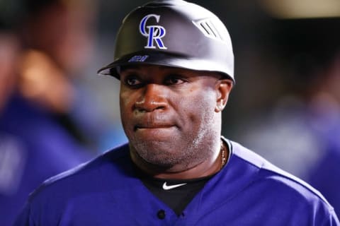 Apr 22, 2016; Denver, CO, USA; Colorado Rockies first base coach Eric Young (21) in the seventh inning against the Los Angeles Dodgers at Coors Field. Mandatory Credit: Isaiah J. Downing-USA TODAY Sports