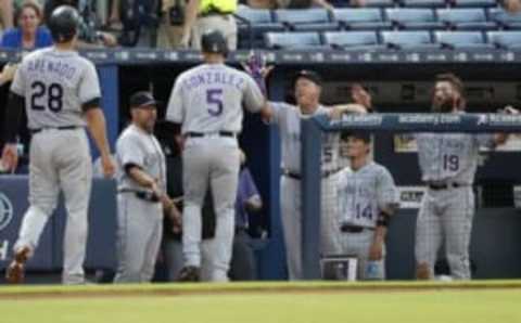 Mandatory Credit: Jason Getz-USA TODAY Sports. Arenado went 2-for-3 with 2 walks, 3 runs and a RBI, his 71st of the season.  Gonzalez also had three hits, a walk and a RBI, the result of a very solid two out at- bat in the first inning.