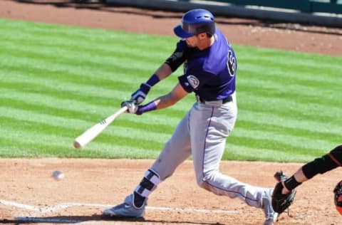 Mar 9, 2016; Scottsdale, AZ, USA; Colorado Rockies center fielder David Dahl (67) grounds out in the third inning against the San Francisco Giants at Scottsdale Stadium. Mandatory Credit: Matt Kartozian-USA TODAY Sports