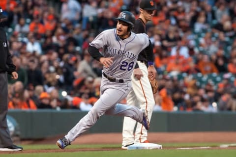 May 6, 2016; San Francisco, CA, USA; Colorado Rockies third baseman Nolan Arenado (28) rounds third base on his way to home plate during the second inning at AT&T Park. Mandatory Credit: Ed Szczepanski-USA TODAY Sports