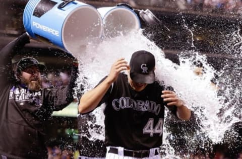 Jul 9, 2016; Denver, CO, USA; Colorado Rockies starting pitcher Tyler Anderson (44) is doused with water by teammates following the game against the Philadelphia Phillies at Coors Field. The Rockies defeated the Phillies 8-3. Mandatory Credit: Isaiah J. Downing-USA TODAY Sports