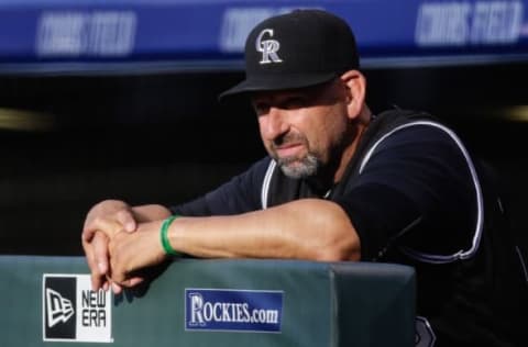 Jul 9, 2016; Denver, CO, USA; Colorado Rockies manager Walt Weiss (22) looks on in the first inning against the Philadelphia Phillies at Coors Field. The Rockies defeated the Phillies 8-3. Mandatory Credit: Isaiah J. Downing-USA TODAY Sports