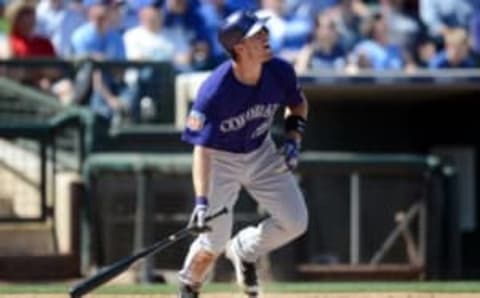 Mar 8, 2016; Surprise, AZ, USA; Colorado Rockies catcher Tom Murphy (23) runs to first base after hitting a pitch against the Kansas City Royals during the fourth inning at Surprise Stadium. Mandatory Credit: Joe Camporeale-USA TODAY Sports