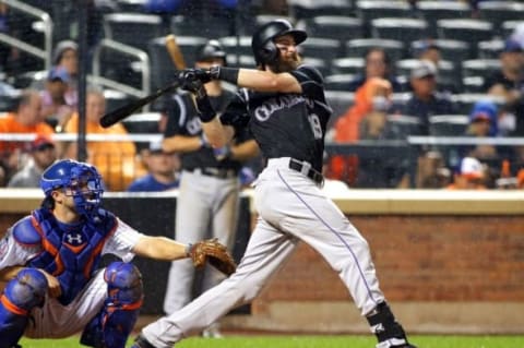 Jul 30, 2016; New York City, NY, USA; Colorado Rockies centerfielder Charlie Blackmon (19) doubles against the New York Mets during the fifth inning at Citi Field. The Rockies won 7-2. Mandatory Credit: Andy Marlin-USA TODAY Sports