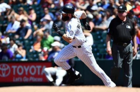 Aug 17, 2016; Denver, CO, USA; Colorado Rockies center fielder Charlie Blackmon (19) runs out a double in the first inning against the Washington Nationals at Coors Field. Mandatory Credit: Ron Chenoy-USA TODAY Sports