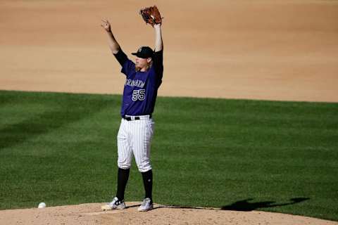 Sep 4, 2016; Denver, CO, USA; Colorado Rockies starting pitcher Jon Gray (55) stretches on the mound in the seventh inning against the Arizona Diamondbacks at Coors Field. Mandatory Credit: Isaiah J. Downing-USA TODAY Sports