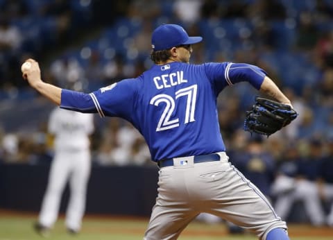 Sep 3, 2016; St. Petersburg, FL, USA; Toronto Blue Jays relief pitcher Brett Cecil (27) throws a pitch against the Tampa Bay Rays at Tropicana Field. Mandatory Credit: Kim Klement-USA TODAY Sports