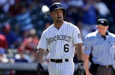 Aug 9, 2016; Denver, CO, USA; Colorado Rockies left fielder Ryan Raburn (6) reacts after striking out in the eighth inning against the Texas Rangers at Coors Field. The Rangers defeated the Rockies 7-5. Mandatory Credit: Isaiah J. Downing-USA TODAY Sports