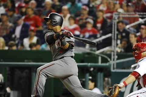 Sep 26, 2016; Washington, DC, USA; Arizona Diamondbacks second baseman Jean Segura (2) hits a solo home run against the Washington Nationals during the fourth inning at Nationals Park. Mandatory Credit: Brad Mills-USA TODAY Sports