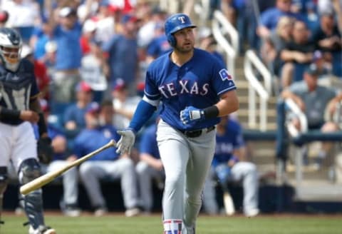 Mar 11, 2016; Phoenix, AZ, USA; Texas Rangers left fielder Joey Gallo (13) in the first inning during a spring training game against the Milwaukee Brewers at Maryvale Baseball Park. Mandatory Credit: Rick Scuteri-USA TODAY Sports