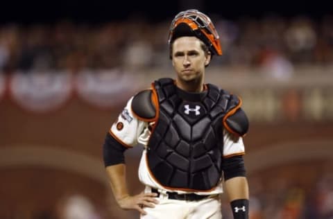 Oct 11, 2016; San Francisco, CA, USA; San Francisco Giants catcher Buster Posey (28) reacts during the ninth inning of game four of the 2016 NLDS playoff baseball game against the Chicago Cubs at AT&T Park. Mandatory Credit: John Hefti-USA TODAY Sports