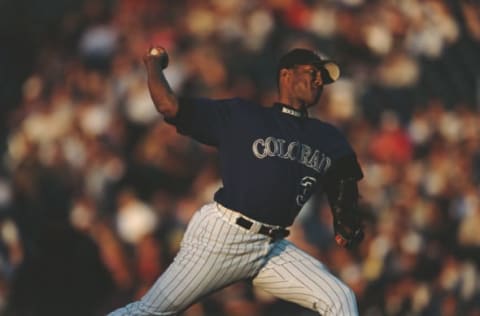 Pedro Astacio pitches for the Colorado Rockies against the Seattle Mariners during their Major League Baseball National League West game on 14 June 2001 at Coors Field, Denver, Colorado, United States. (Photo by Brian Bahr/Allsport/Getty Images)