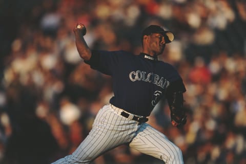 Pedro Astacio pitches for the Colorado Rockies against the Seattle Mariners on 14 June 2001 at Coors Field, Denver, Colorado, United States. (Photo by Brian Bahr/Allsport/Getty Images)