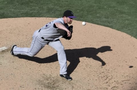 SAN DIEGO, CA – SEPTEMBER 2: Scott Oberg #45 of the Colorado Rockies pitches during the ninth inning of a baseball game against the San Diego Padresat PETCO Park on September 2, 2018 in San Diego, California. (Photo by Denis Poroy/Getty Images)