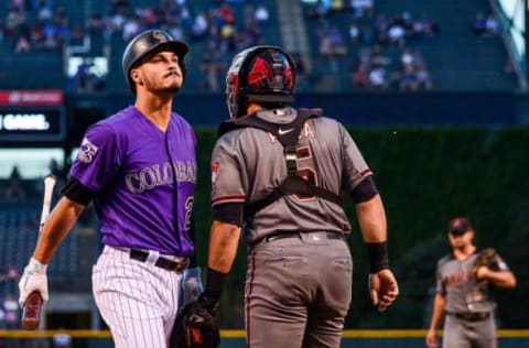 DENVER, CO – SEPTEMBER 10: Nolan Arenado #28 of the Colorado Rockies reacts after striking out in the first inning of a game against the Arizona Diamondbacks at Coors Field on September 10, 2018 in Denver, Colorado. (Photo by Dustin Bradford/Getty Images)