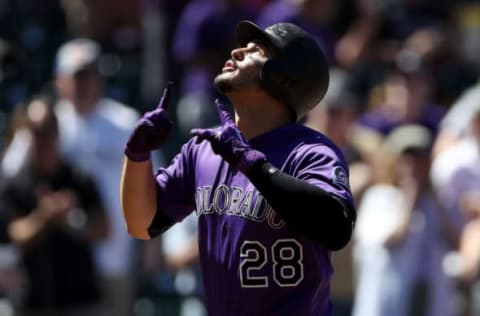 DENVER, CO – SEPTEMBER 13: Nolan Arenado #28 of the Colorado Rockies celebrates as he crosses the plate after hitting a home run in the first inning against the Arizona Diamondbacks at Coors Field on September 13, 2018 in Denver, Colorado. (Photo by Matthew Stockman/Getty Images)