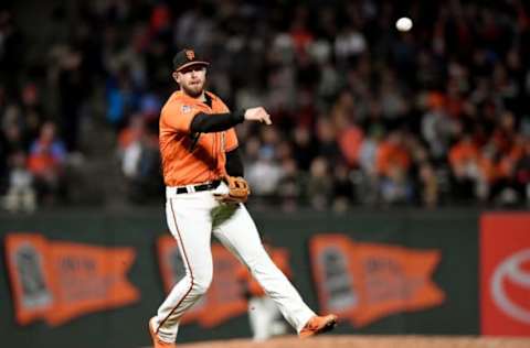 SAN FRANCISCO, CA – SEPTEMBER 14: Evan Longoria #10 of the San Francisco Giants throw to first base off balance throwing out Trevor Story #27 of the Colorado Rockies in the top of the fourth inning at AT&T Park on September 14, 2018 in San Francisco, California. (Photo by Thearon W. Henderson/Getty Images)