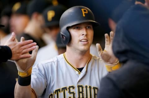 MILWAUKEE, WI – SEPTEMBER 15: Corey Dickerson #12 of the Pittsburgh Pirates celebrates with teammates after scoring a run in the second inning against the Milwaukee Brewers at Miller Park on September 15, 2018 in Milwaukee, Wisconsin. (Photo by Dylan Buell/Getty Images)