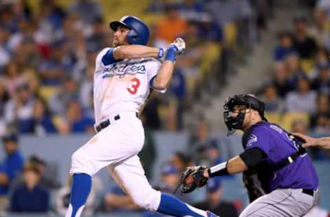 LOS ANGELES, CA – SEPTEMBER 18: Chris Taylor #3 of the Los Angeles Dodgers celebrates his solo homerun to win the game 3-2 over the Colorado Rockies during the 10th inning at Dodger Stadium on September 18, 2018 in Los Angeles, California. (Photo by Harry How/Getty Images)