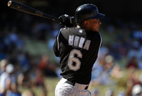 LOS ANGELES, CA – SEPTEMBER 18: Melvin Mora #6 of the Colorado Rockies hits a single in the seventh inning against the Los Angeles Dodgers at Dodger Stadium on September 18, 2010 in Los Angeles, California. (Photo by Lisa Blumenfeld/Getty Images)