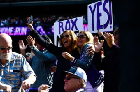 DENVER, CO – SEPTEMBER 30: Colorado Rockies fans cheer after a first inning home run by Nolan Arenado #28 of the Colorado Rockies during a game between the Colorado Rockies and the Washington Nationals at Coors Field on September 30, 2018 in Denver, Colorado. (Photo by Dustin Bradford/Getty Images)