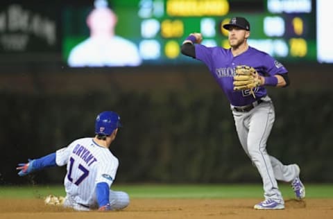 CHICAGO, IL – OCTOBER 02: Trevor Story #27 of the Colorado Rockies turns a double play after forcing out Kris Bryant #17 of the Chicago Cubs at second base in the sixth inning during the National League Wild Card Game at Wrigley Field on October 2, 2018 in Chicago, Illinois. (Photo by Stacy Revere/Getty Images)