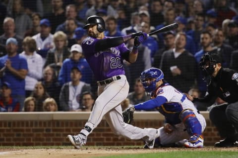 CHICAGO, IL – OCTOBER 02: Ian Desmond #20 of the Colorado Rockies grounds into fielder’s choice in the eleventh inning against the Chicago Cubs during the National League Wild Card Game at Wrigley Field on October 2, 2018 in Chicago, Illinois. (Photo by Jonathan Daniel/Getty Images)