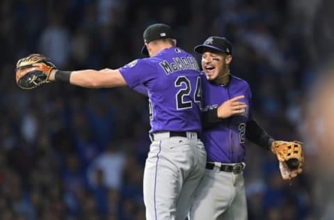 CHICAGO, IL – OCTOBER 02: Nolan Arenado #28 of the Colorado Rockies celebrates with Ryan McMahon #24 after defeating the Chicago Cubs 2-1 in thirteen innings to win the National League Wild Card Game at Wrigley Field on October 2, 2018 in Chicago, Illinois. (Photo by Stacy Revere/Getty Images)