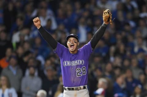 CHICAGO, IL – OCTOBER 02: Nolan Arenado #28 of the Colorado Rockies celebrates defeating the Chicago Cubs 2-1 in thirteen innings to win the National League Wild Card Game at Wrigley Field on October 2, 2018 in Chicago, Illinois. (Photo by Stacy Revere/Getty Images)