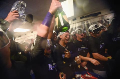 CHICAGO, IL – OCTOBER 02: The Colorado Rockies celebrate in the clubhouse after defeating the Chicago Cubs 2-1 in thirteen innings to win the National League Wild Card Game at Wrigley Field on October 2, 2018 in Chicago, Illinois. (Photo by Stacy Revere/Getty Images)