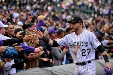 DENVER, CO – SEPTEMBER 30: Trevor Story #27 of the Colorado Rockies gives high fives to fans during a fan appreciation walk around the field after the final game of the Colorado Rockies regular season against the Washington Nationals at Coors Field on September 30, 2018 in Denver, Colorado. (Photo by Dustin Bradford/Getty Images)