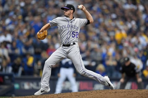 MILWAUKEE, WI – OCTOBER 04: Chris Rusin #52 of the Colorado Rockies throws a pitch during Game One of the National League Division Series against the Milwaukee Brewers at Miller Park on October 4, 2018 in Milwaukee, Wisconsin. (Photo by Stacy Revere/Getty Images)