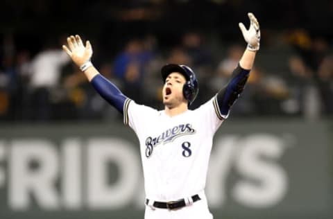 MILWAUKEE, WI – OCTOBER 19: Ryan Braun #8 of the Milwaukee Brewers celebrates after hitting an RBI double to score Christian Yelich #22 against Hyun-Jin Ryu #99 of the Los Angeles Dodgers during the second inning in Game Six of the National League Championship Series at Miller Park on October 19, 2018 in Milwaukee, Wisconsin. (Photo by Stacy Revere/Getty Images)