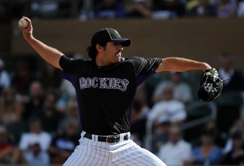 SCOTTSDALE, AZ – MARCH 07: Casey Weathers #50 of the Colorado Rockies pitches against the Los Angeles Dodgers at Salt River Fields at Talking Stick on March 7, 2011 in Scottsdale, Arizona. (Photo by Lisa Blumenfeld/Getty Images)