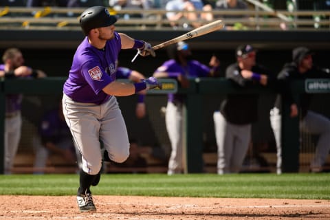 MESA, ARIZONA – MARCH 01: Garrett Hampson #1 of the Colorado Rockies hits a two run home run in the fifth inning of the spring training game against the Oakland Athletics at HoHoKam Stadium on March 01, 2019 in Mesa, Arizona. (Photo by Jennifer Stewart/Getty Images)