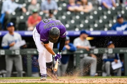 DENVER, CO – APRIL 5: Nolan Arenado #28 of the Colorado Rockies hits the ground with his bat after hitting a pop up ion the ninth inning of a game against the Los Angeles Dodgers during the Colorado Rockies home opener at Coors Field on April 5, 2019 in Denver, Colorado. (Photo by Dustin Bradford/Getty Images)