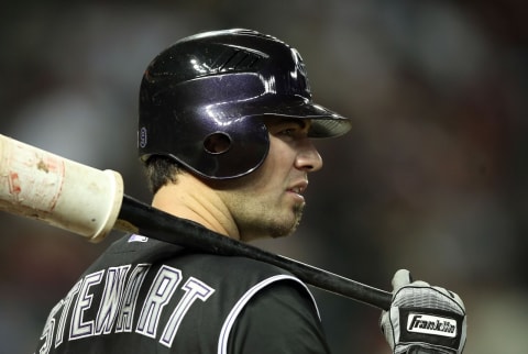 PHOENIX, AZ – MAY 03: Ian Stewart #9 of the Colorado Rockies warms up on deck during the Major League Baseball game against the Arizona Diamondbacks at Chase Field on May 3, 2011 in Phoenix, Arizona. The Diamondbacks defeated the Rockies 4-3. (Photo by Christian Petersen/Getty Images)