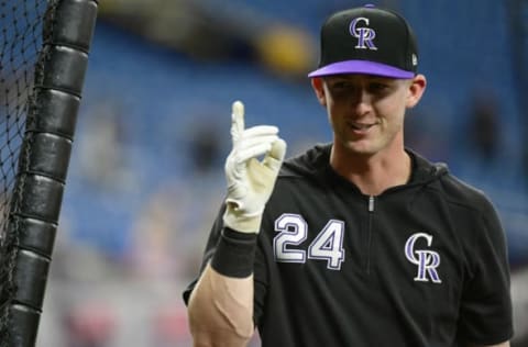 ST PETERSBURG, FLORIDA – APRIL 01: Ryan McMahon #24 of the Colorado Rockies reacts to a hit during batting practice before a game against the Tampa Bay Rays at Tropicana Field on April 01, 2019 in St Petersburg, Florida. (Photo by Julio Aguilar/Getty Images)