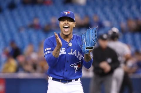 TORONTO, ON – MAY 11: Marcus Stroman #6 of the Toronto Blue Jays reacts after three quality defensive plays were made behind him in the field to end the first inning during MLB game action against the Chicago White Sox at Rogers Centre on May 11, 2019 in Toronto, Canada. (Photo by Tom Szczerbowski/Getty Images)